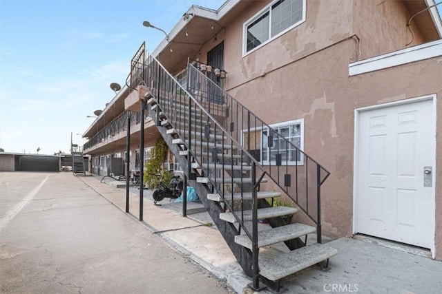 view of building exterior featuring stairs