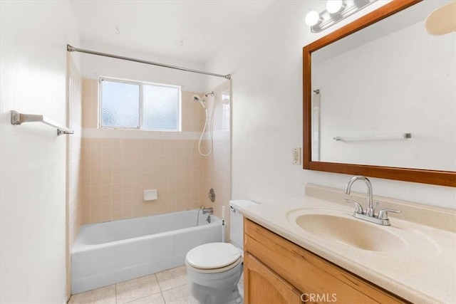 bathroom featuring toilet, vanity, shower / washtub combination, and tile patterned floors