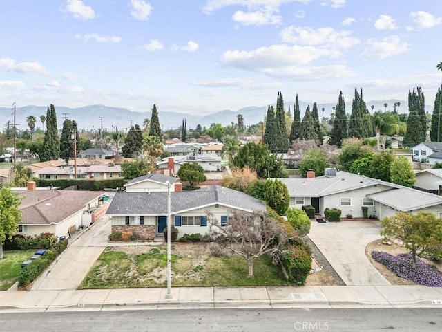 aerial view featuring a residential view and a mountain view