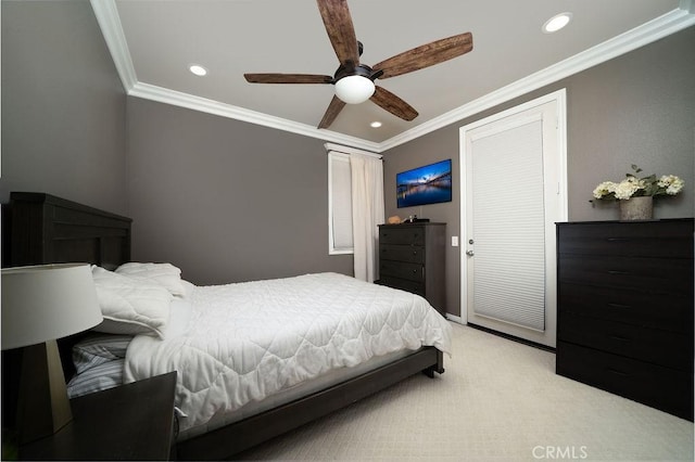 bedroom with ceiling fan, recessed lighting, light carpet, baseboards, and crown molding