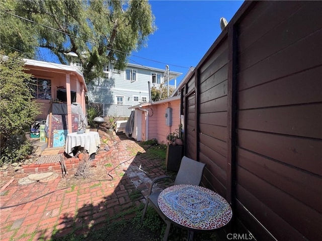 view of yard with a patio area and fence