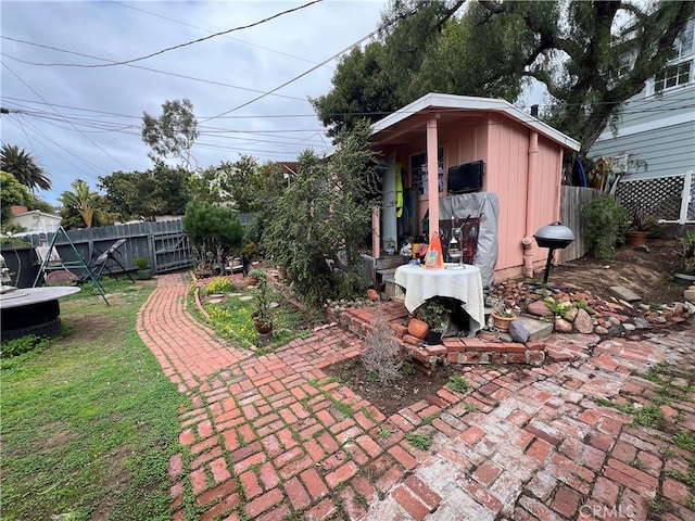 view of yard with a patio area and fence