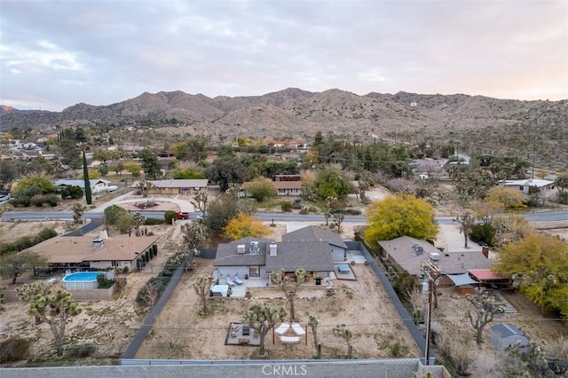 drone / aerial view featuring a mountain view