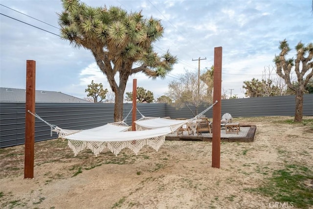 view of yard with fence