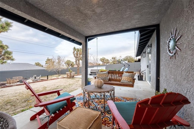 view of patio / terrace with fence