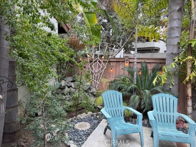 view of patio with fence