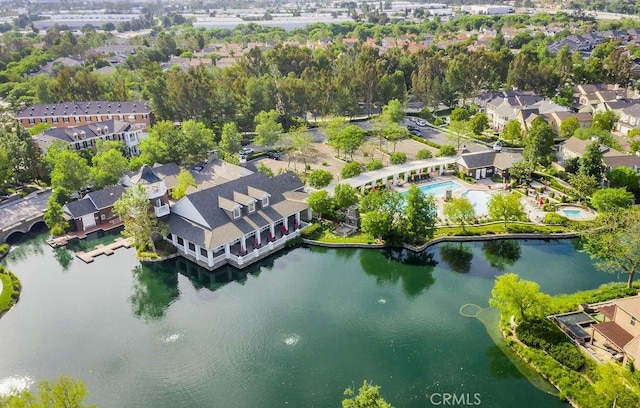 bird's eye view featuring a water view and a residential view