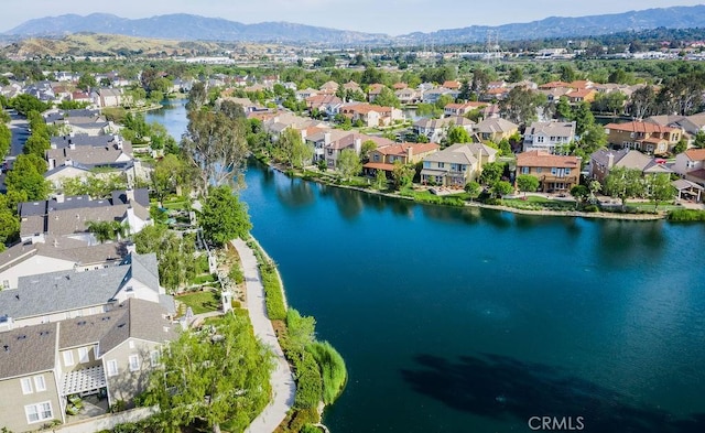 bird's eye view with a residential view and a water and mountain view