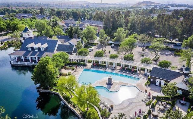 bird's eye view with a water view