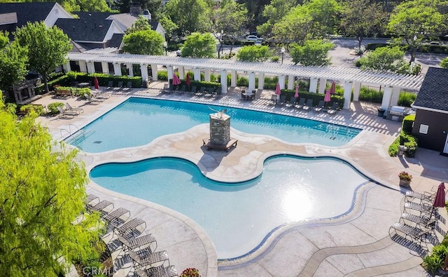 community pool featuring a patio area