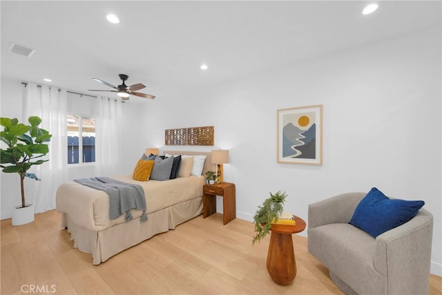 bedroom featuring light wood-style floors, recessed lighting, visible vents, and ceiling fan