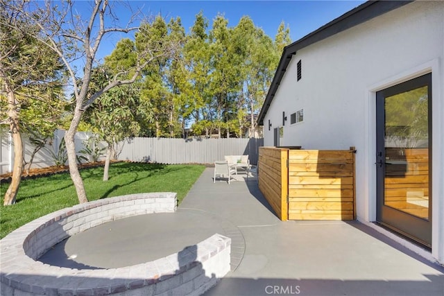 view of patio with a fenced backyard