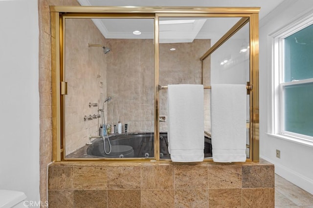 bathroom featuring tile patterned floors, ornamental molding, and a wealth of natural light
