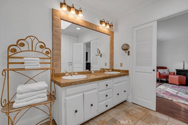 bathroom with double vanity and a sink