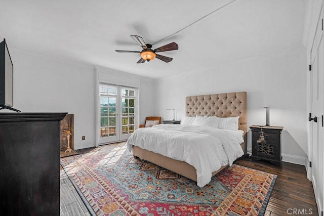 bedroom with baseboards, ceiling fan, and wood finished floors