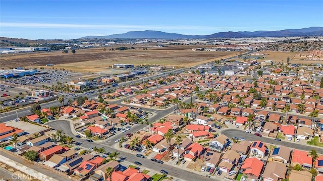 drone / aerial view with a residential view and a mountain view