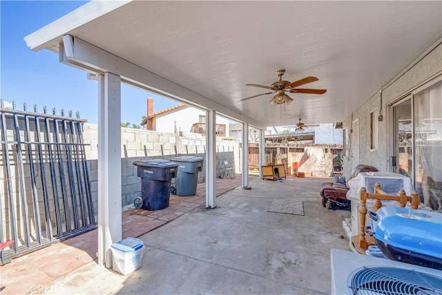 view of patio / terrace featuring a fenced backyard and a ceiling fan