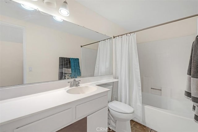 full bathroom featuring shower / bath combo, tile patterned flooring, vanity, and toilet