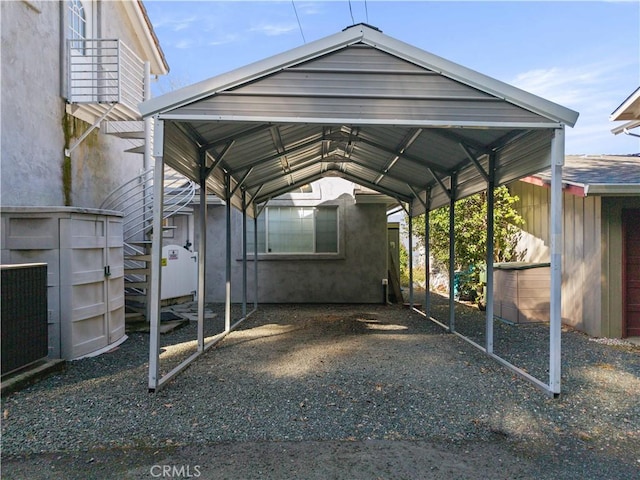 view of parking with a carport