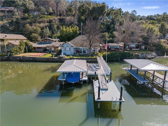 dock area featuring a water view and boat lift