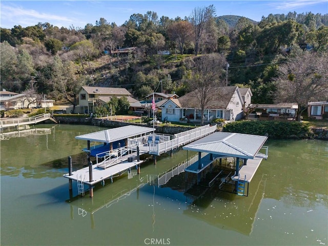 dock area featuring a water view and boat lift