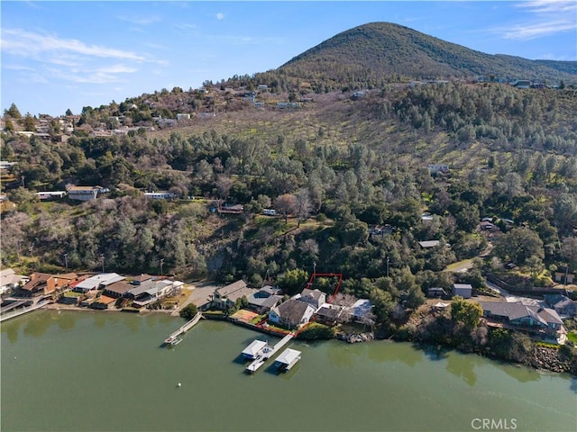 bird's eye view featuring a water and mountain view