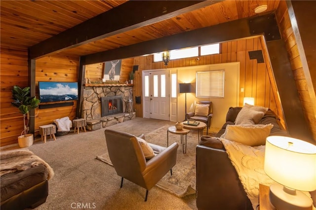 living area with wooden ceiling, carpet floors, wood walls, a fireplace, and beam ceiling