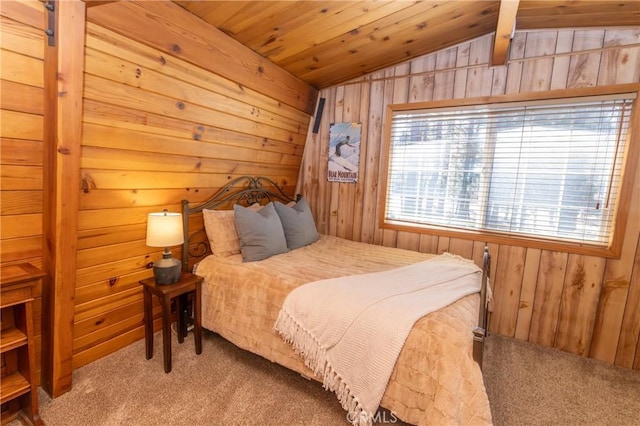 carpeted bedroom featuring vaulted ceiling, wooden ceiling, and wooden walls