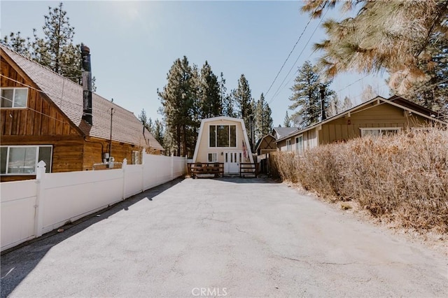 view of street featuring driveway