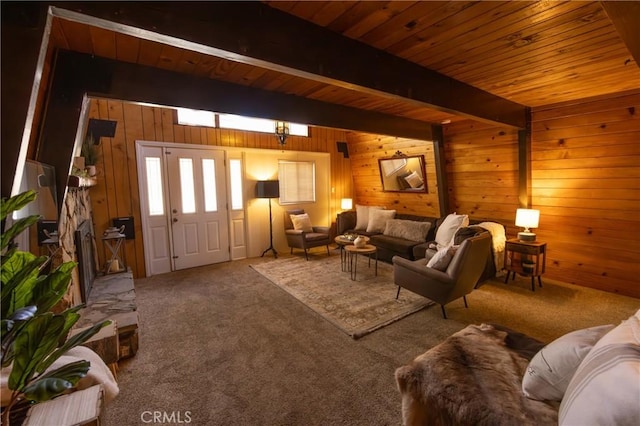 carpeted living room featuring wood ceiling, beam ceiling, and wood walls