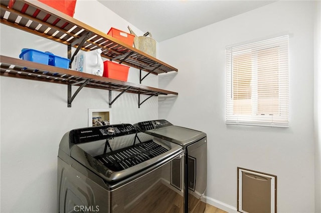 32388 Corte Palacio, Temecula, CA 92592 - washroom with washer and dryer, wood finished floors, and baseboards
