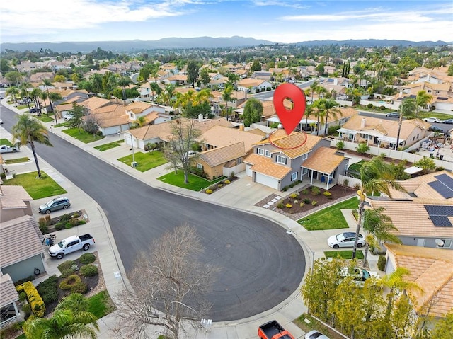 bird's eye view featuring a residential view and a mountain view