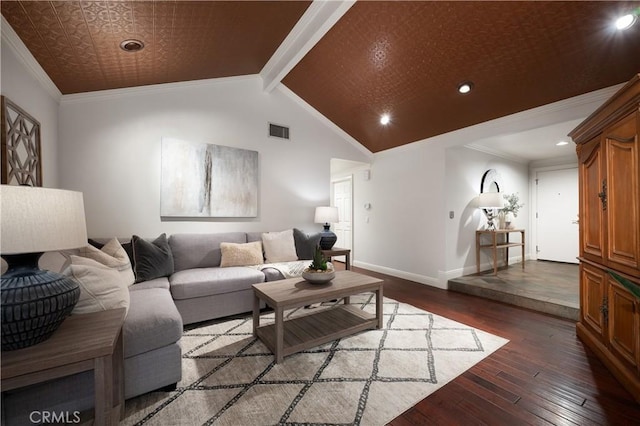 living area featuring lofted ceiling, visible vents, baseboards, wood-type flooring, and crown molding