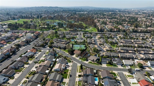 birds eye view of property with a residential view