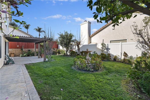 view of yard featuring a patio area, fence, and a pergola