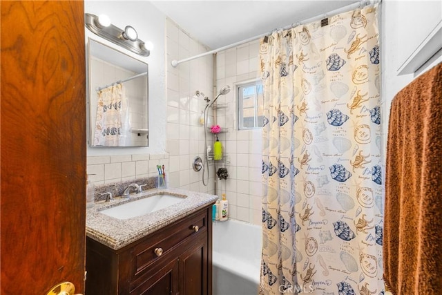 full bathroom featuring tasteful backsplash, shower / tub combo with curtain, and vanity