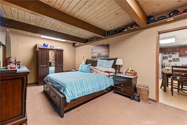 bedroom with wood ceiling, carpet flooring, and beamed ceiling