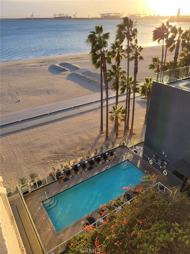 25 15th Pl Unit 101, Long Beach, CA 90802 - aerial view at dusk of view of pool area and view of water and beach