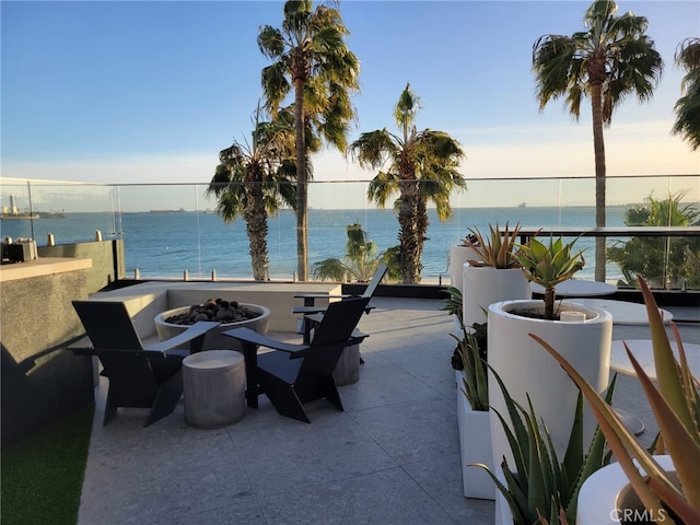25 15th Pl Unit 101, Long Beach, CA 90802 - view of patio / terrace with a fire pit and a water view