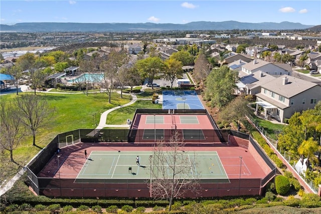 drone / aerial view with a residential view and a mountain view