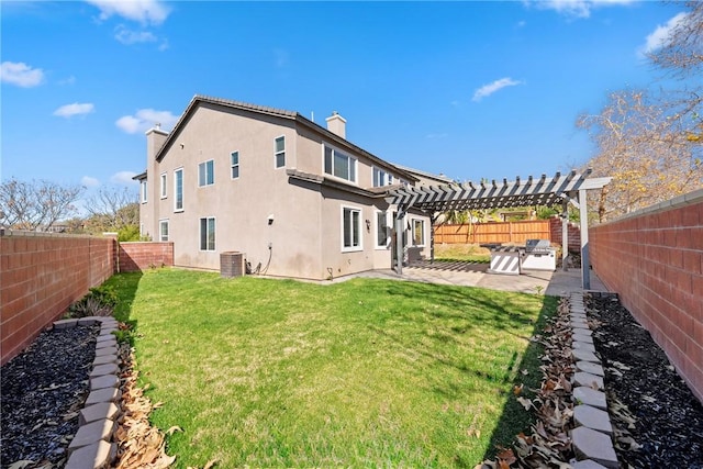 back of house featuring a fenced backyard, a lawn, a pergola, a chimney, and stucco siding