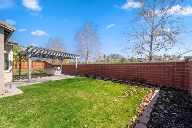 view of yard with a patio, a fenced backyard, and a pergola