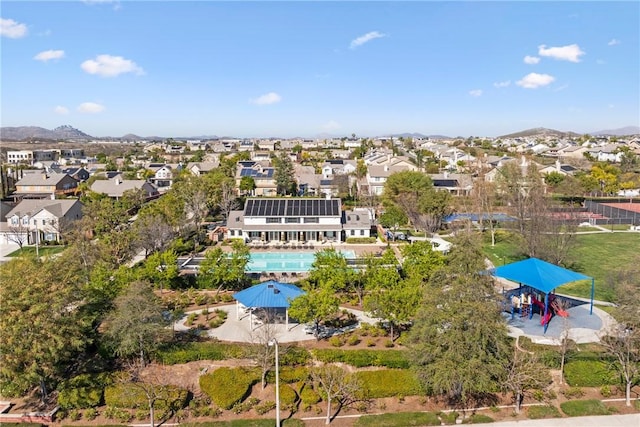 drone / aerial view with a residential view and a mountain view