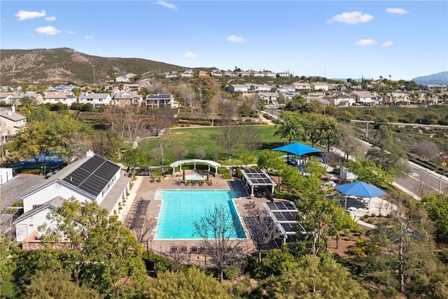 exterior space featuring a residential view and a mountain view