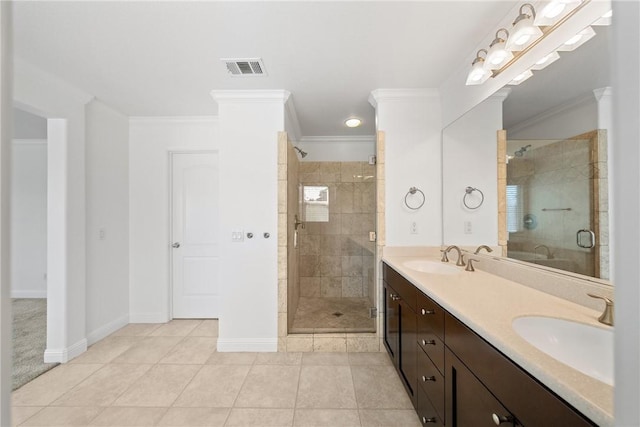 full bathroom with crown molding, visible vents, a sink, and a shower stall