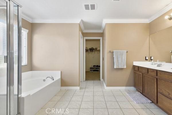 bathroom with a bath, a shower stall, visible vents, and crown molding