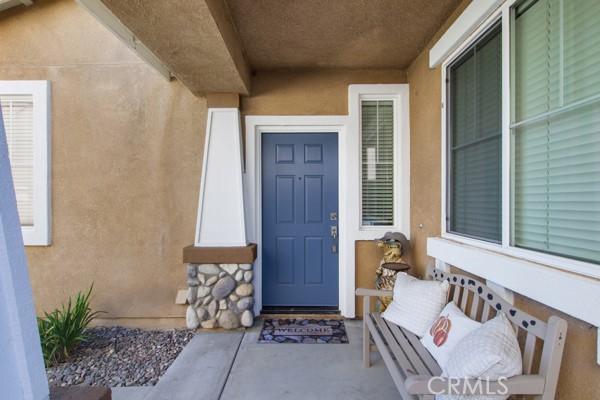 property entrance featuring stucco siding