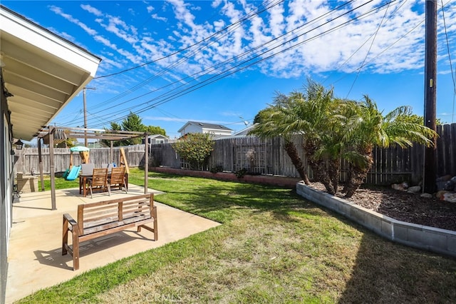 view of yard with a patio area and a fenced backyard