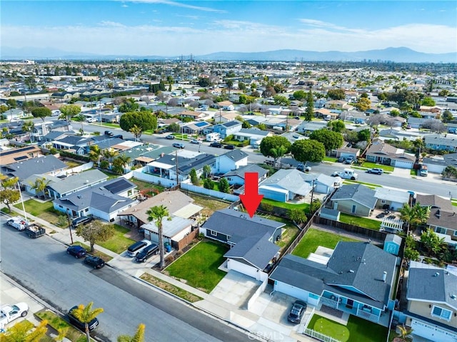 bird's eye view featuring a residential view and a mountain view