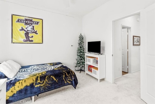 bedroom with light colored carpet